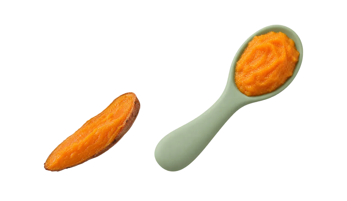 Sweet potato for a 6 month old: a soft roasted wedge to hold, and mashed sweet potato on a preloaded baby spoon